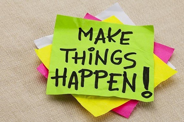 post-it note reading Make Things Happen