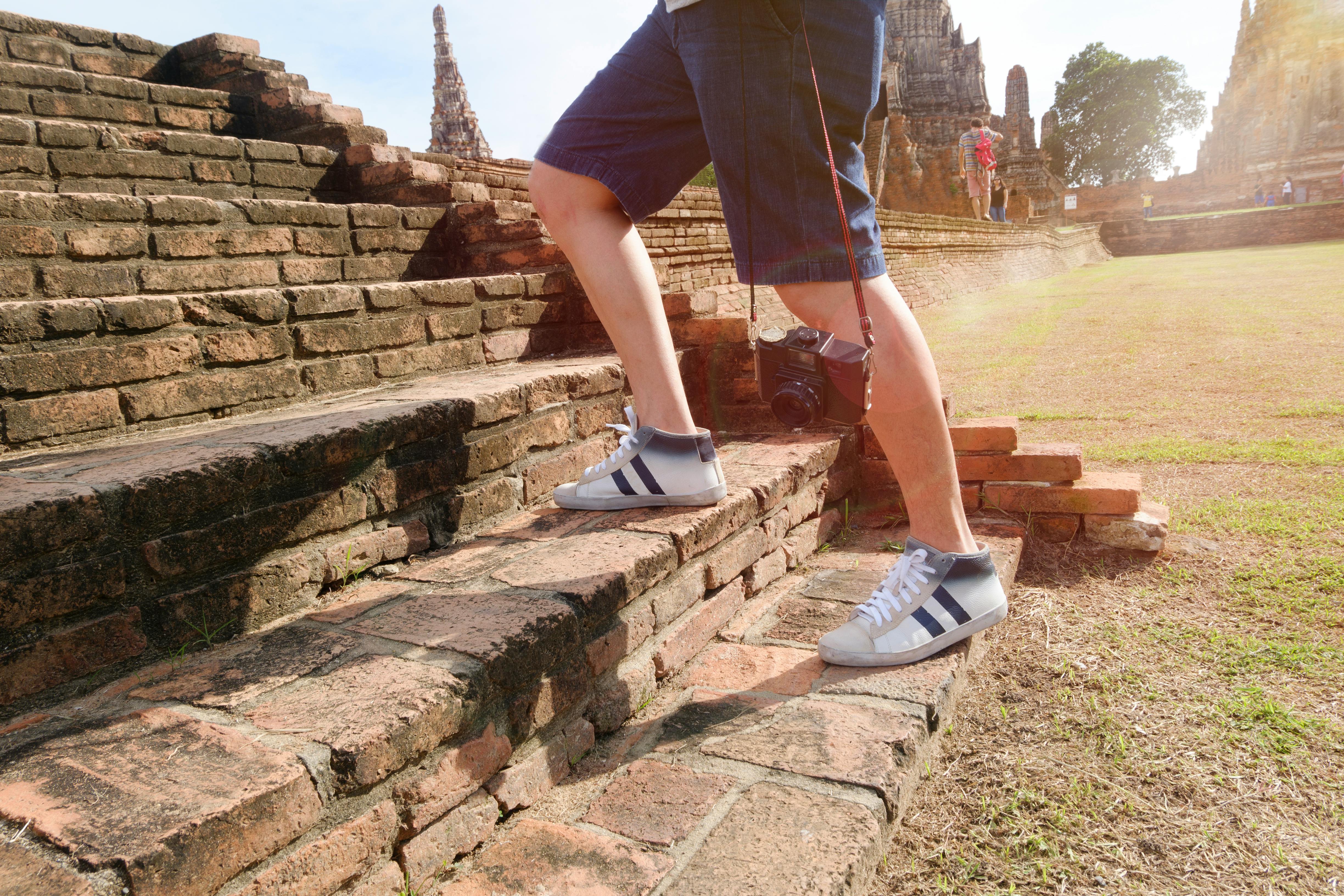 man walking up stairs